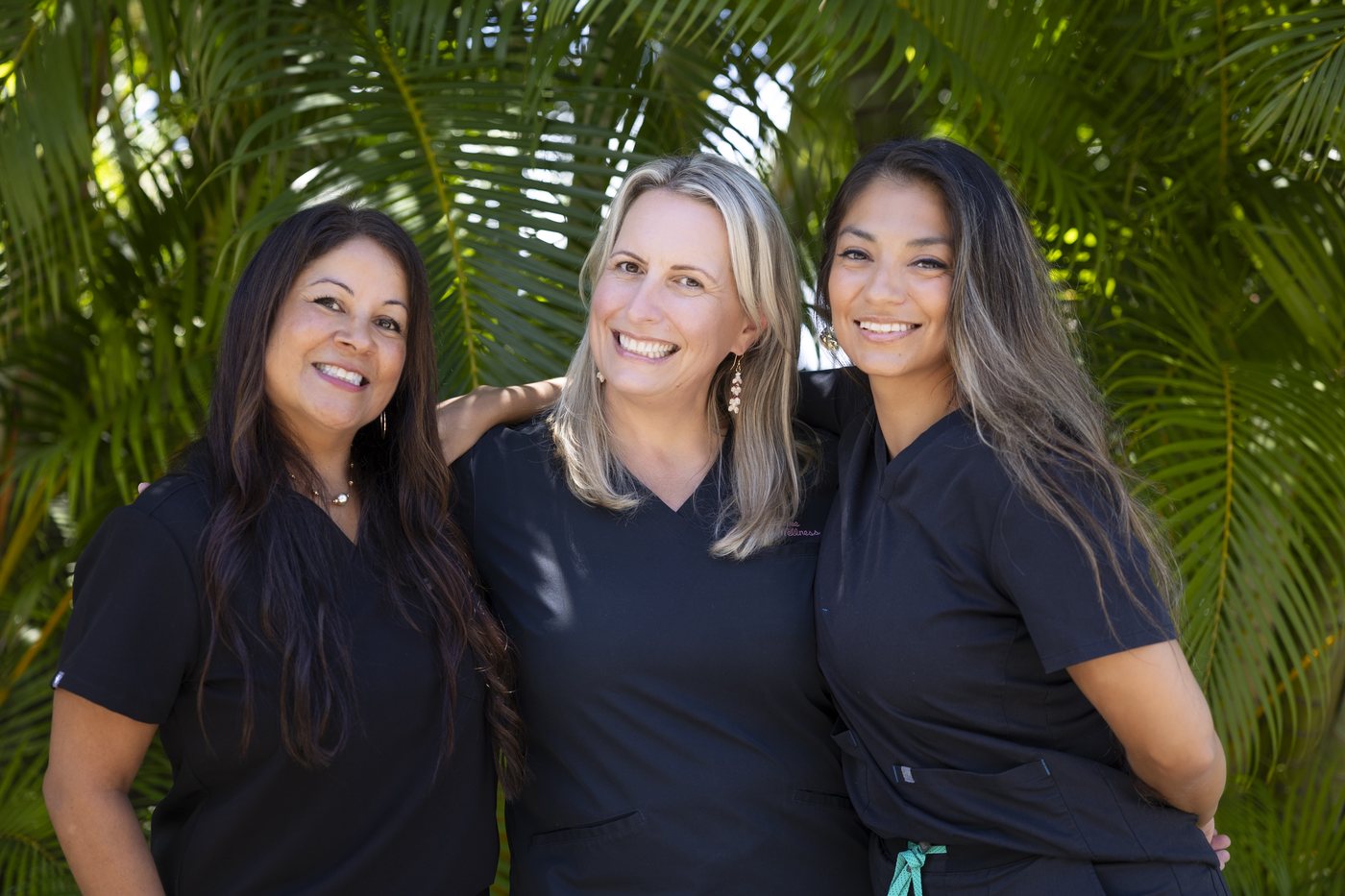Ann Craddock, APRN, Dr. G, and the Wahine Health team outside the Wailea office